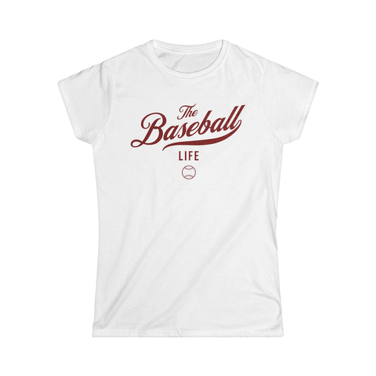 A women's white cap-sleeve crewneck t-shirt with a maroon logo graphic on the front reading 'The Baseball Life' and a small baseball icon, displayed on a solid white background.