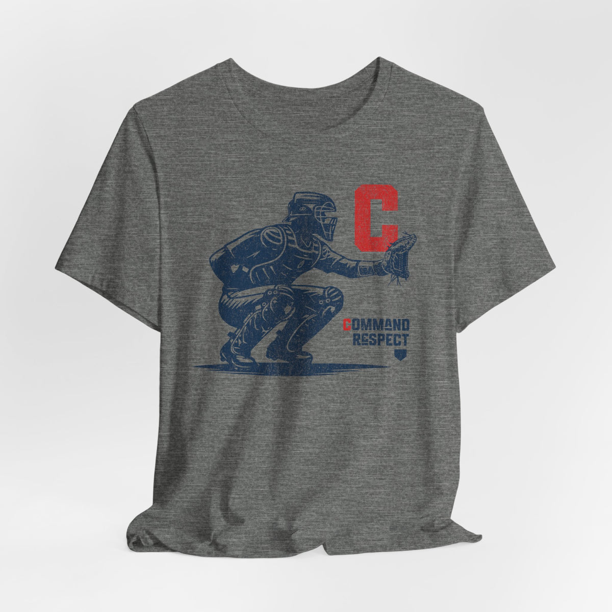 A deep heather grey t-shirt featuring a baseball catcher and the words COMMAND RESPECT in navy, and a red letter C.