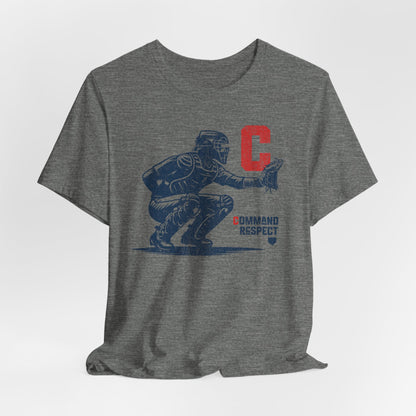 A deep heather grey t-shirt featuring a baseball catcher and the words COMMAND RESPECT in navy, and a red letter C.