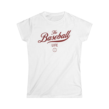 A women's white cap-sleeve crewneck t-shirt with a maroon logo graphic on the front reading 'The Baseball Life' and a small baseball icon, displayed on a solid white background.
