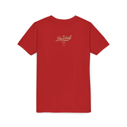 The back of a red youth baseball t-shirt with The Baseball Life logo centered upper back.