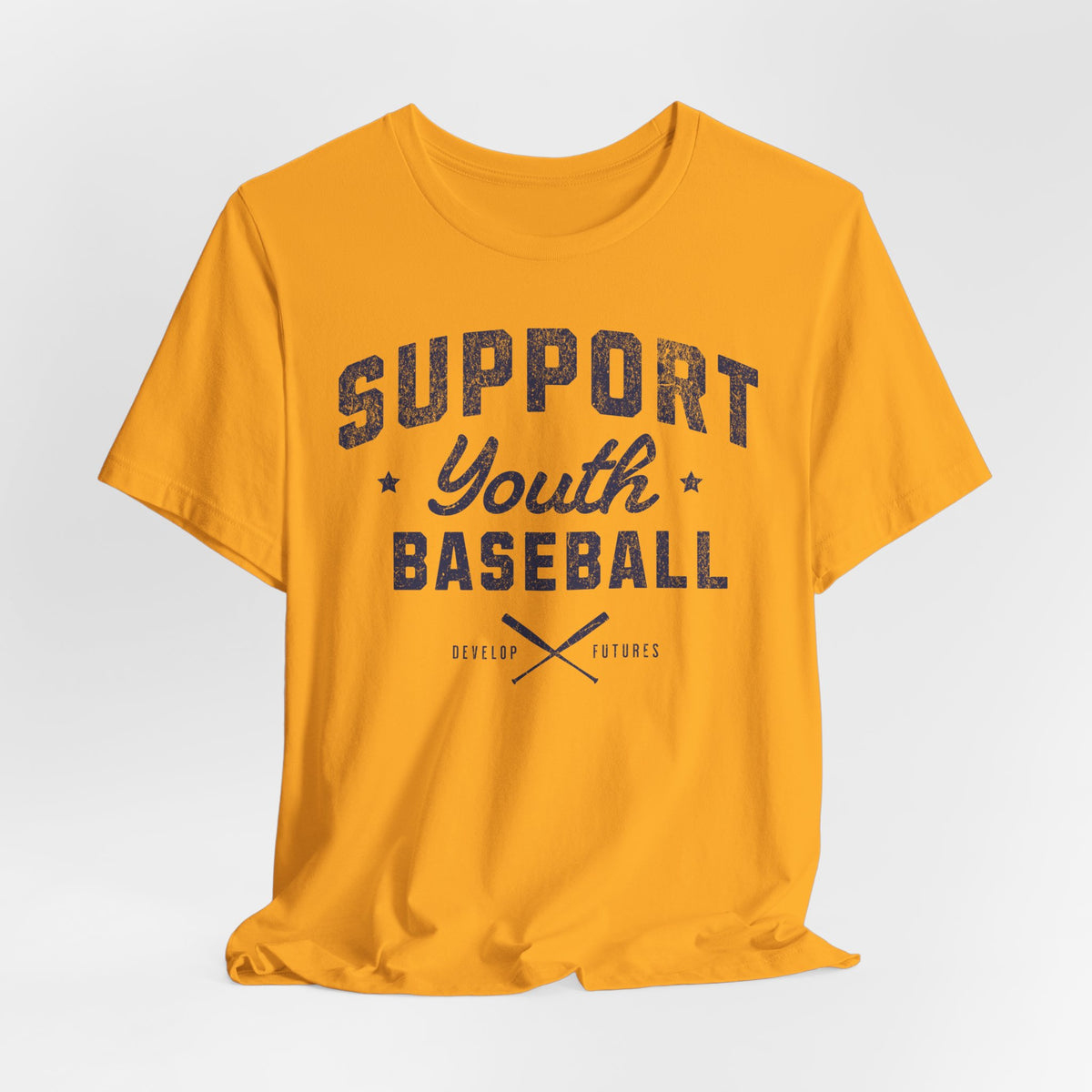 A gold t-shirt with a distressed navy blue graphic on the front that reads SUPPORT YOUTH BASEBALL with crossed bats.