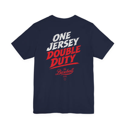 The back of a navy baseball t-shirt featuring a high-energy "ONE JERSEY DOUBLE DUTY" graphic with The Baseball Life logo.
