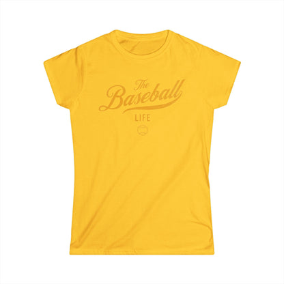 A women's daisy yellow cap-sleeve crewneck t-shirt with a yellow gold logo graphic on the front reading 'The Baseball Life' and a small baseball icon, displayed on a solid white background.