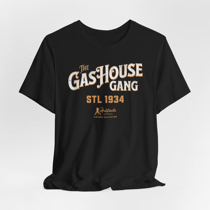 A black short-sleeve t-shirt with a vintage-style graphic print reading 'The Gas House Gang STL 1934' and a small 'Artifacts Collection' logo.