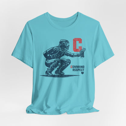 A turquoise t-shirt featuring a baseball catcher and the words COMMAND RESPECT in navy, and a red letter C.