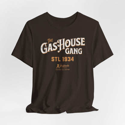 A dark brown short-sleeve t-shirt with a vintage-style graphic print reading 'The Gas House Gang STL 1934' and a small 'Artifacts Collection' logo.