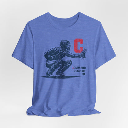 A heather Columbia blue t-shirt featuring a baseball catcher and the words COMMAND RESPECT in navy, and a red letter C.