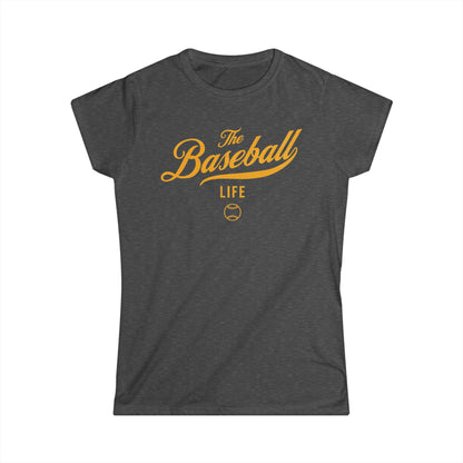 A women's dark heather gray cap-sleeve crewneck t-shirt with a yellow gold logo graphic on the front reading 'The Baseball Life' and a small baseball icon, displayed on a solid white background.