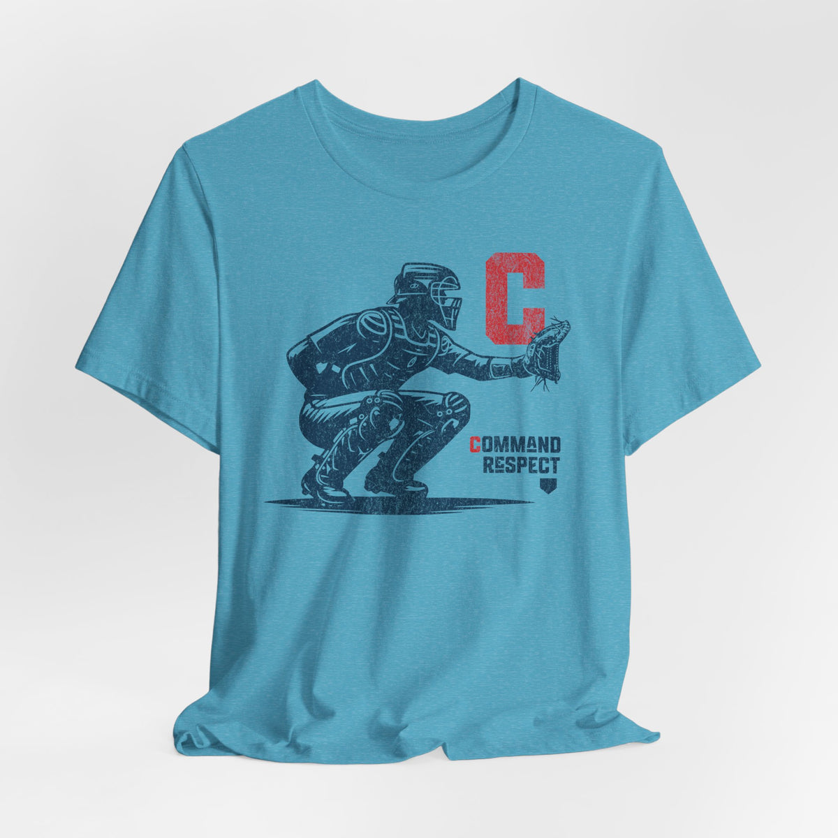 A heather aqua t-shirt featuring a baseball catcher and the words COMMAND RESPECT in navy, and a red letter C.