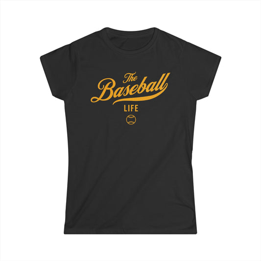 A women's black cap-sleeve crewneck t-shirt with a yellow gold logo graphic on the front reading 'The Baseball Life' and a small baseball icon, displayed on a solid white background.