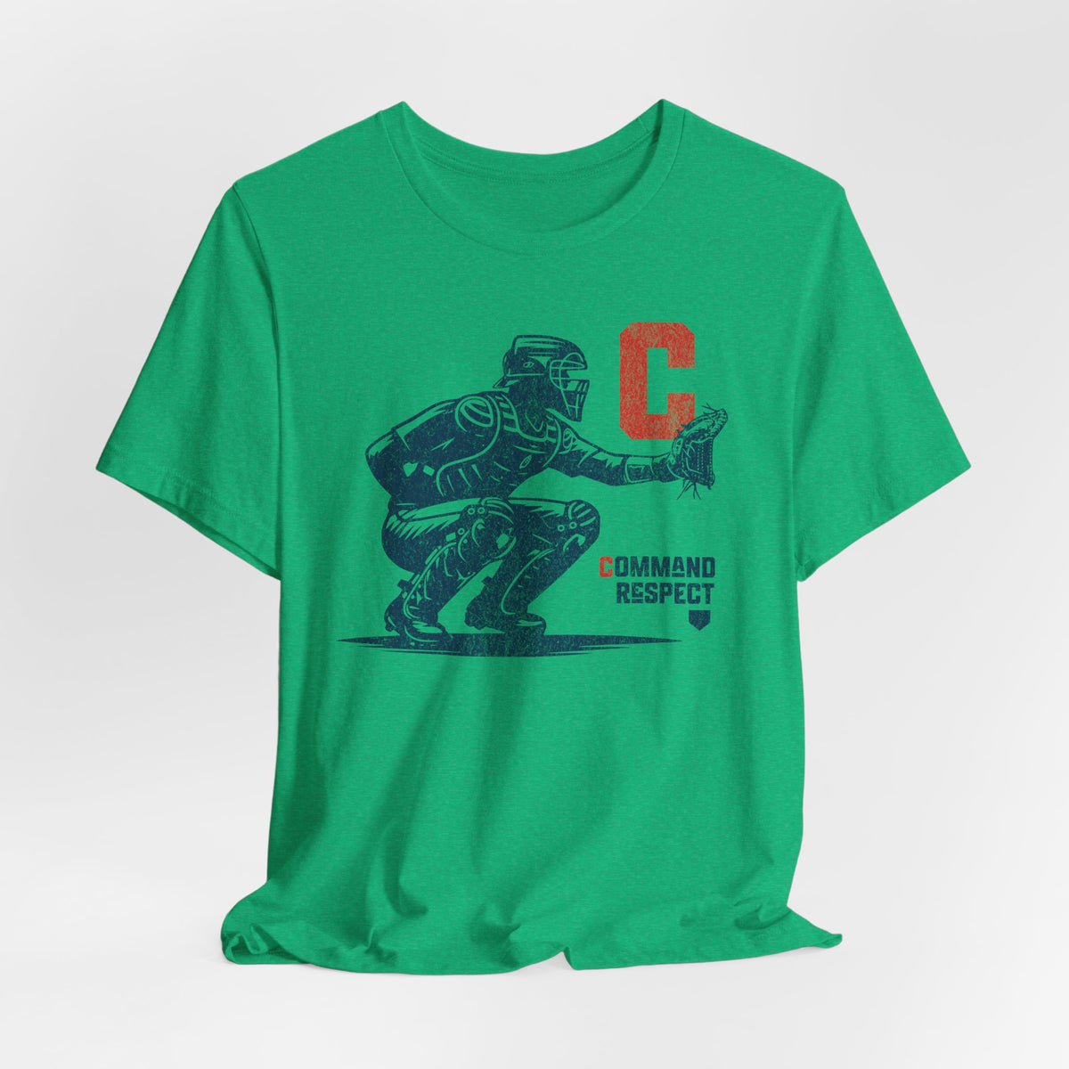 A heather kelly t-shirt featuring a baseball catcher and the words COMMAND RESPECT in navy, and a red letter C.